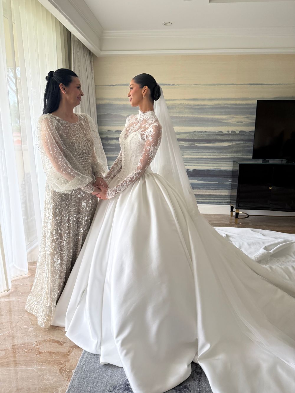 Carolina and her Mom said “Yes”  to the GLAUDI dress. 